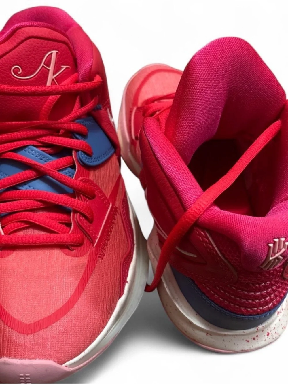 Nike mens Pink Red Basketball Sneakers with Blue Accents (NIKE KYRIE)